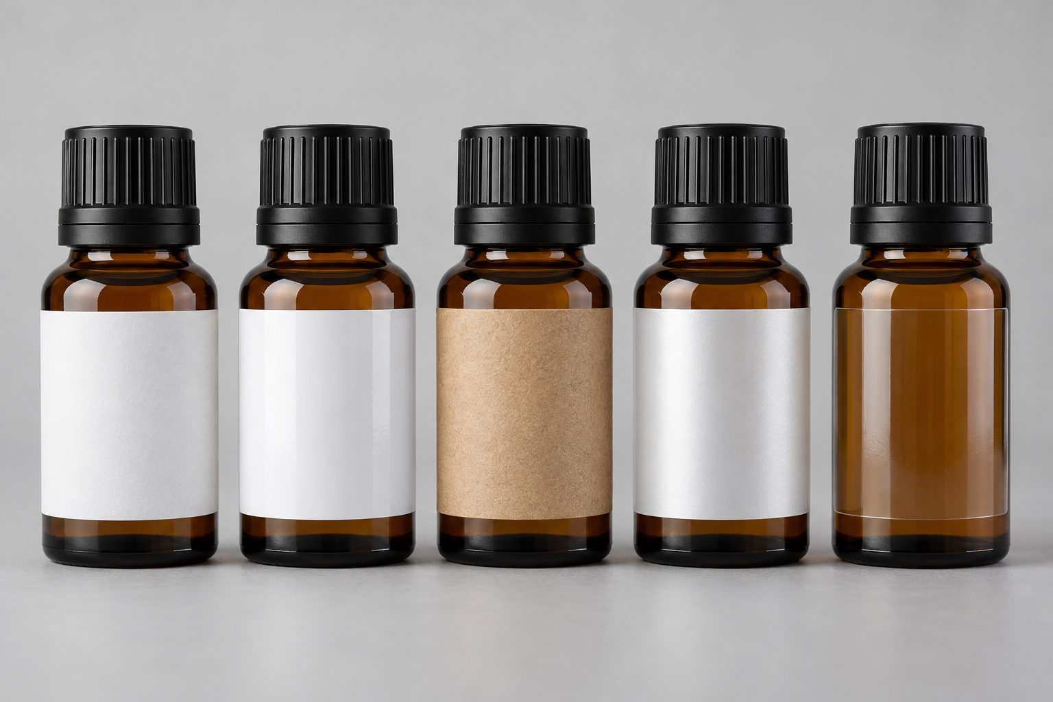 Essential oil label material options including matte, semi-gloss, kraft, BOPP, and clear film