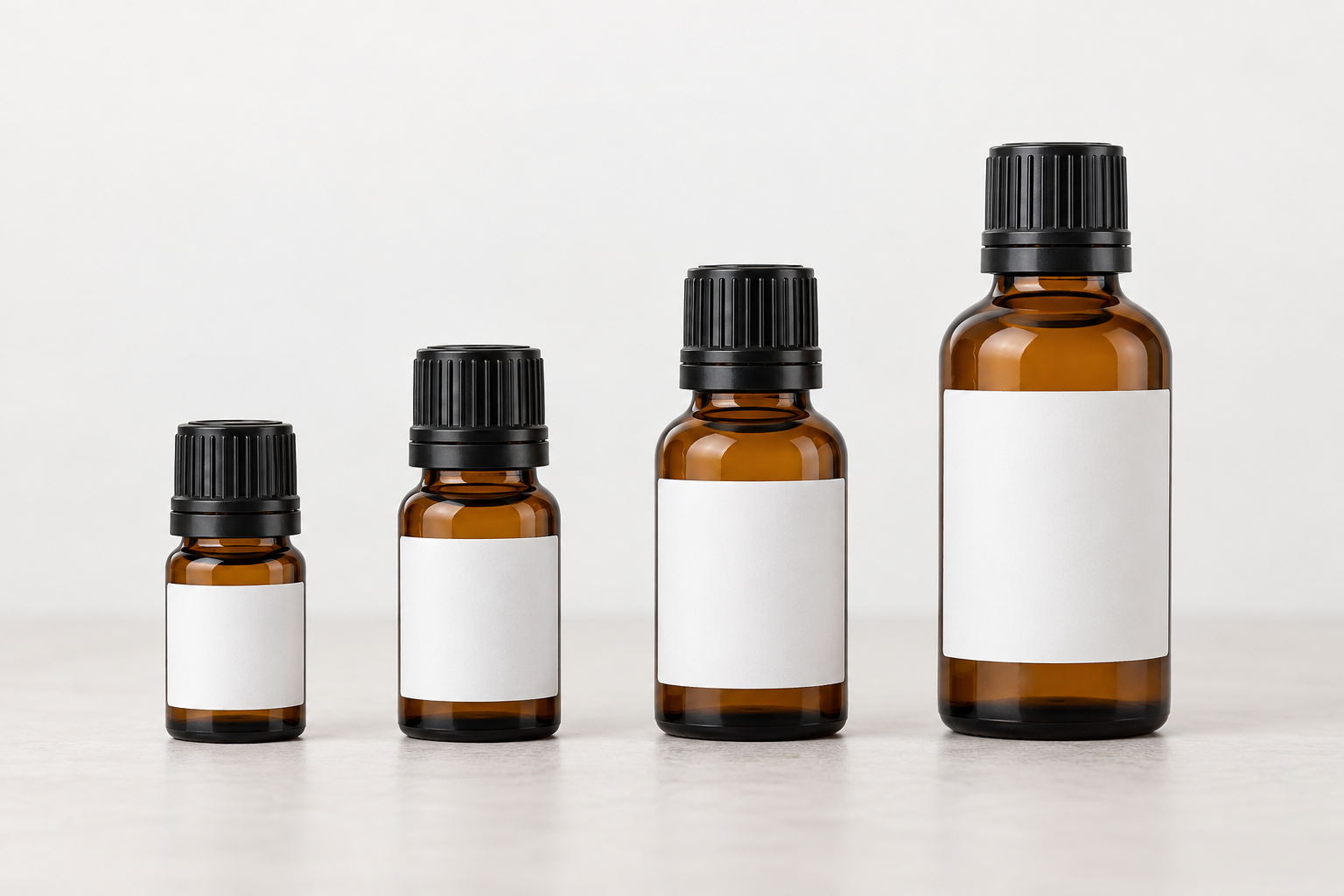 Essential oil bottle label size examples for 5 mL, 10 mL, 15 mL, and 30 mL bottles